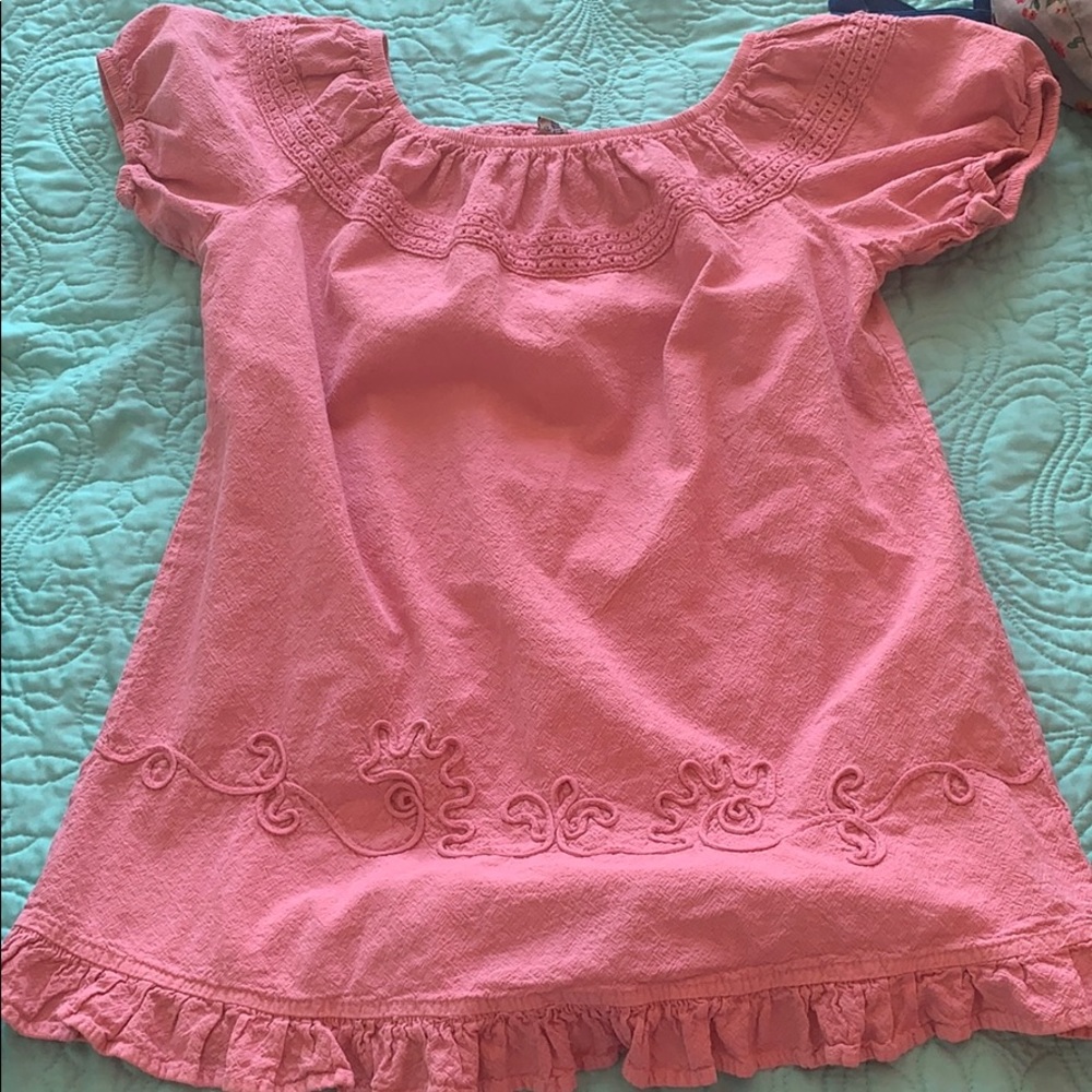 Pink ruffled shirt